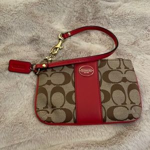 NWOT Coach signature wristlet red and tan